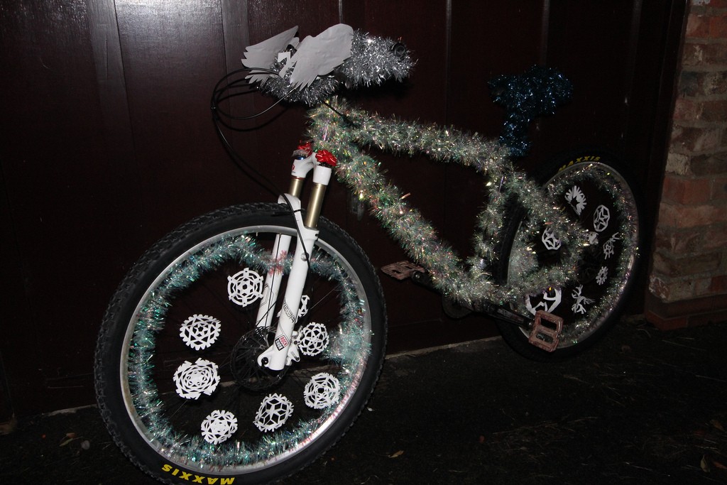 bike decorated in tinsel and snowflakes